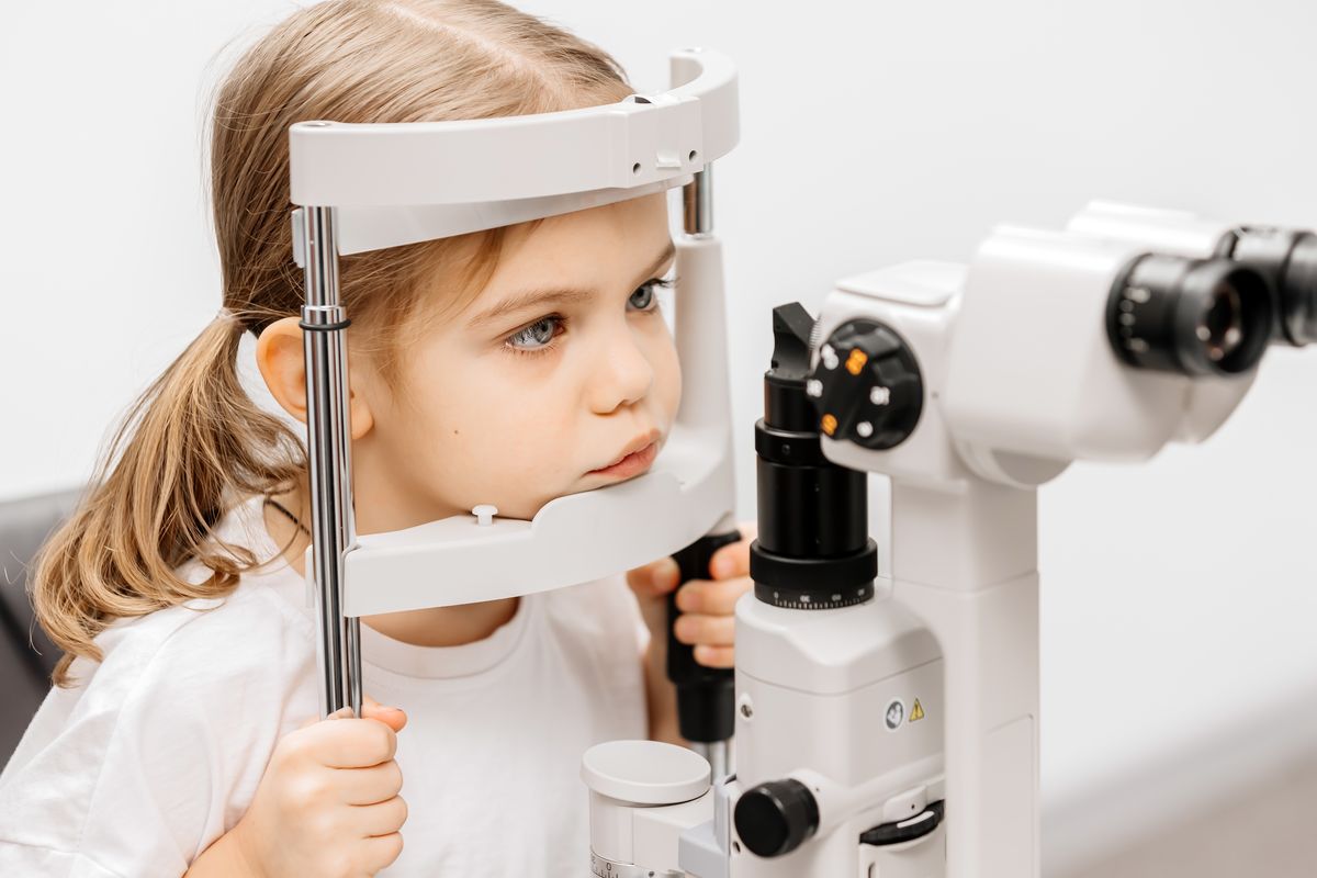 Female Holding Eyewear
